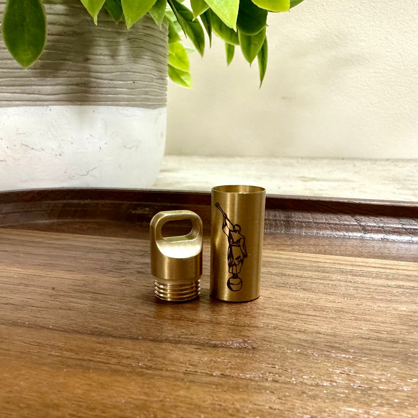 consecrated oil vial made of Brass with a secure screw cap, Cap unscrewed. featuring an elegant engraved design, ideal for Latter-day Saint priesthood blessings.