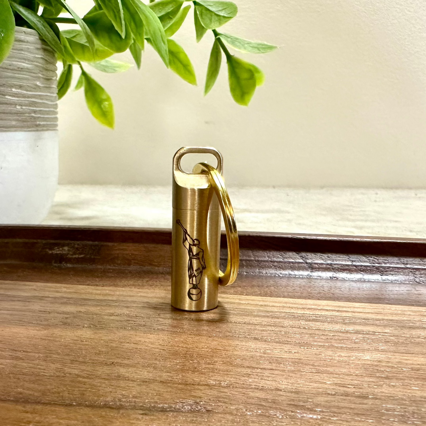 LDS consecrated oil vial made of Brass with a secure screw cap, featuring an elegant engraved design, ideal for Latter-day Saint Gifts and priesthood blessings.