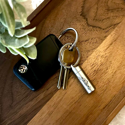 consecrated oil vial made of stainless steel with a secure screw cap, featuring an elegant engraved design, ideal for Latter-day Saint Gift and priesthood blessings