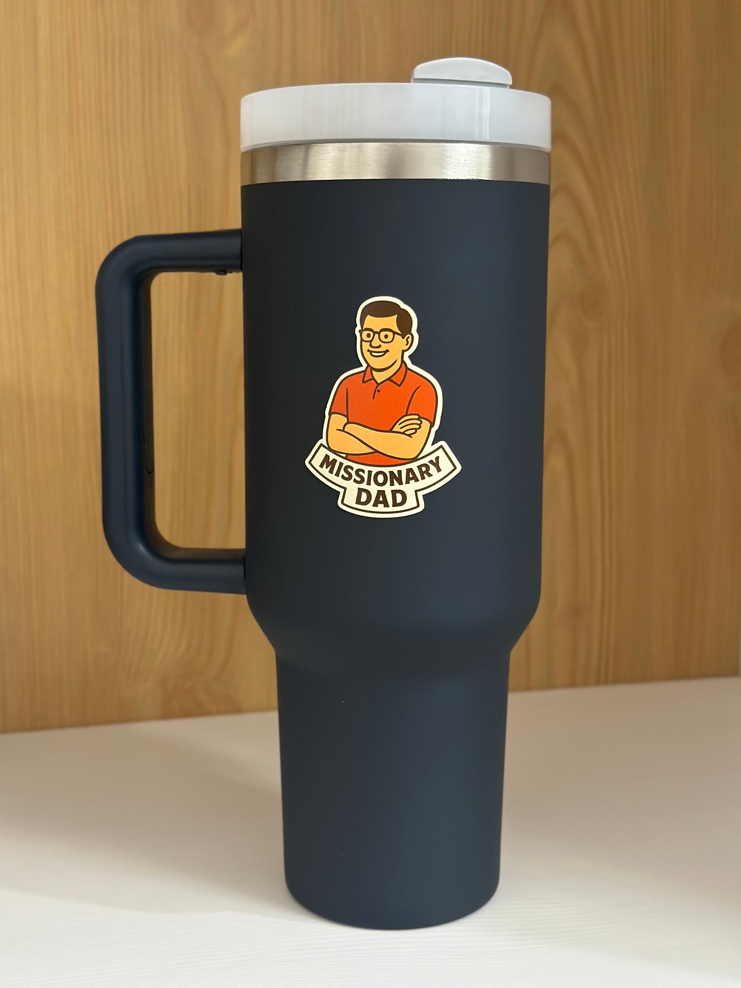 Mormon Missionary dad sticker on a Navy blue water bottle 