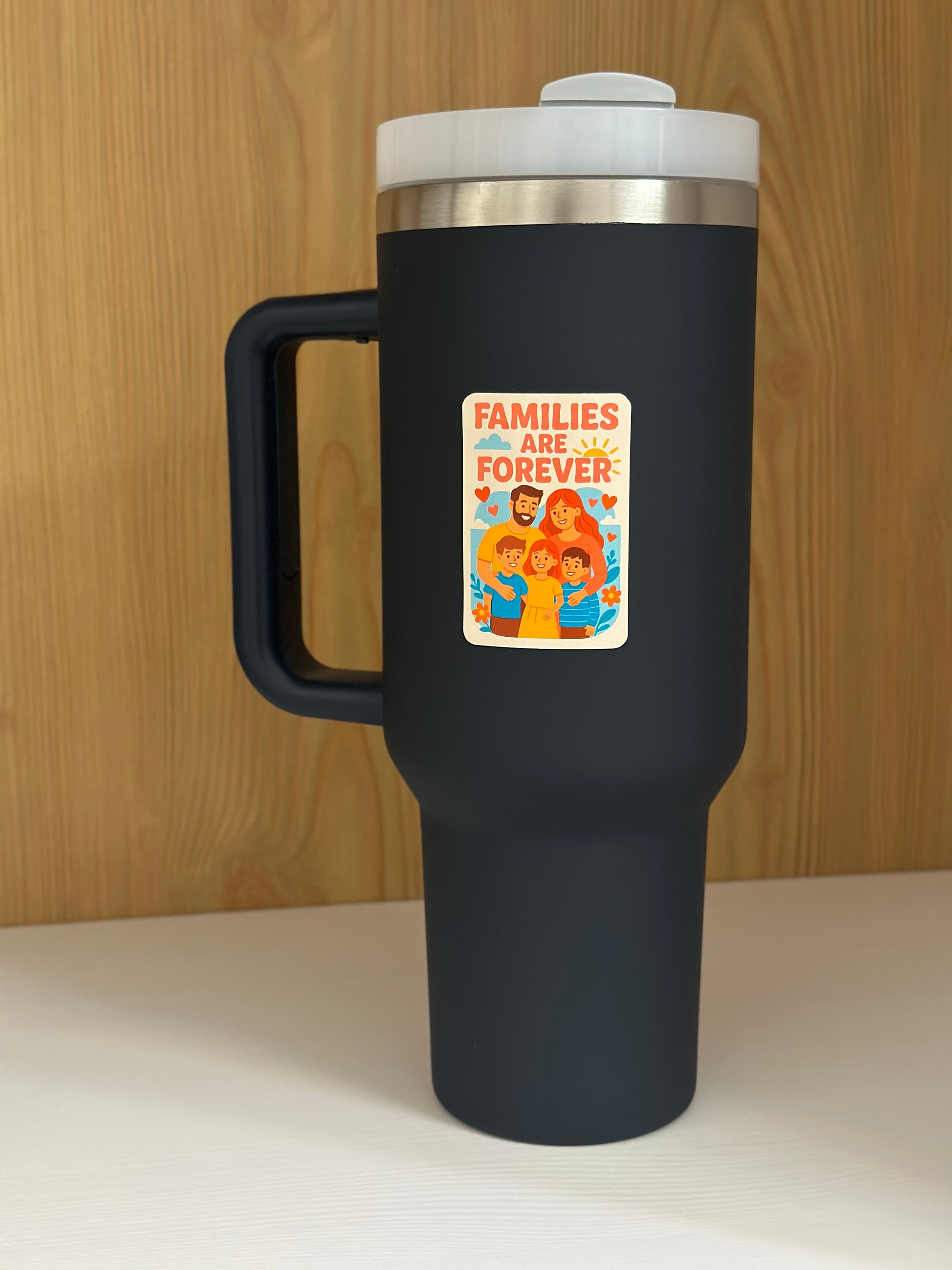 lds sticker on a navy blue tumbler the mormon sticker says families are forever 
