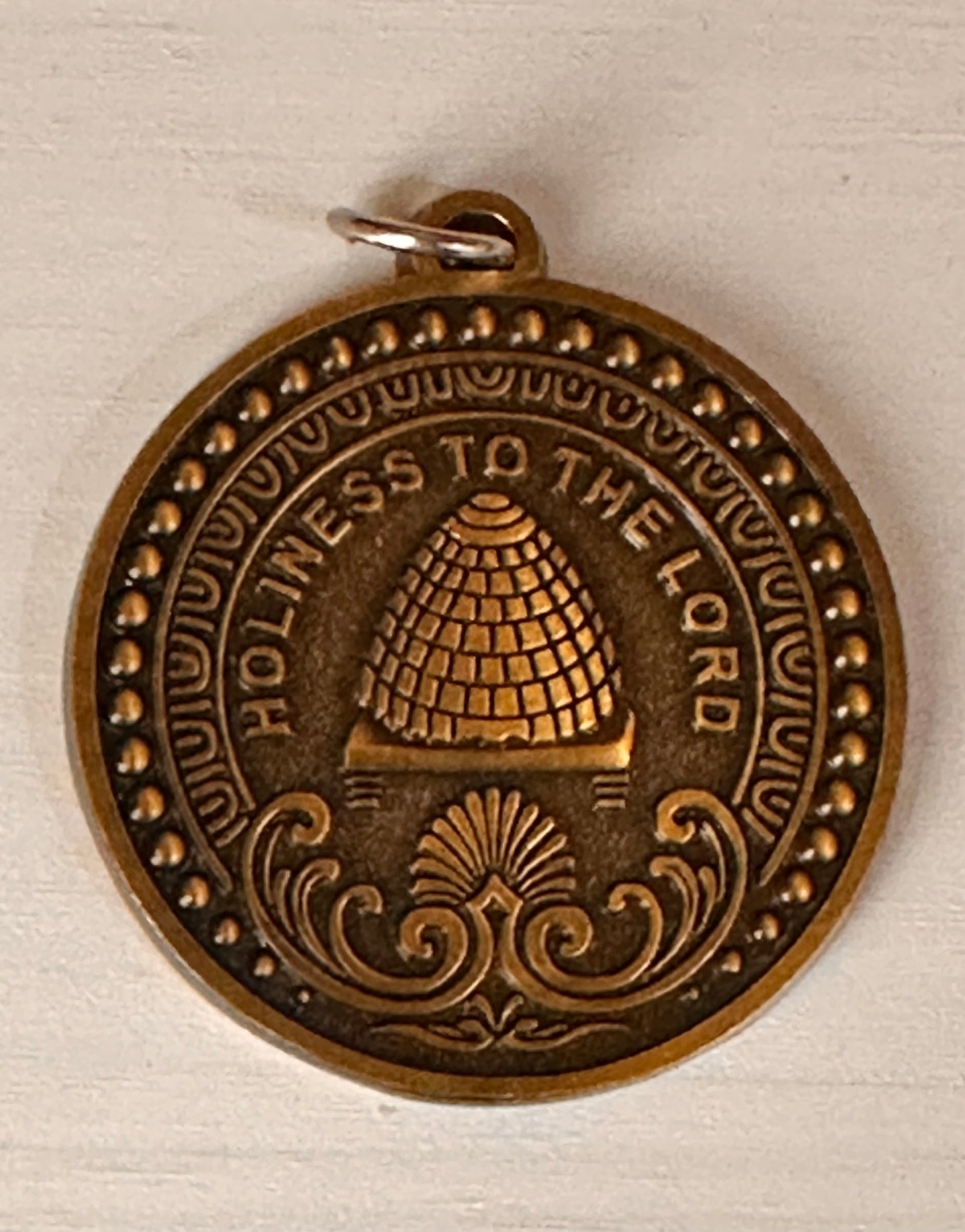 LDS keychain with temple inspired engraving antiqued brass.  
