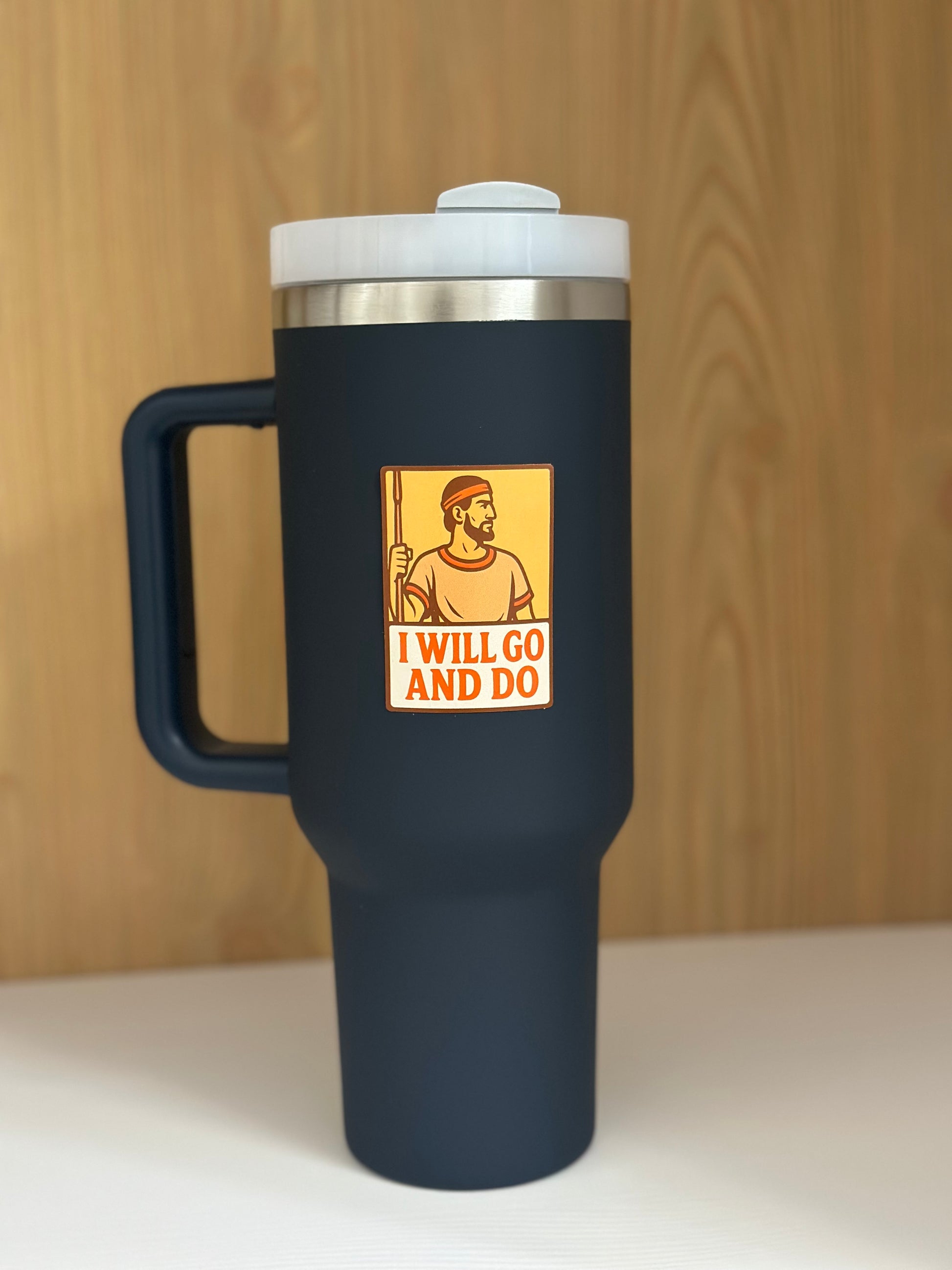 Nephi sticker an LDS hero on a Navy blue tumbler. with the words ' I will go and do' 