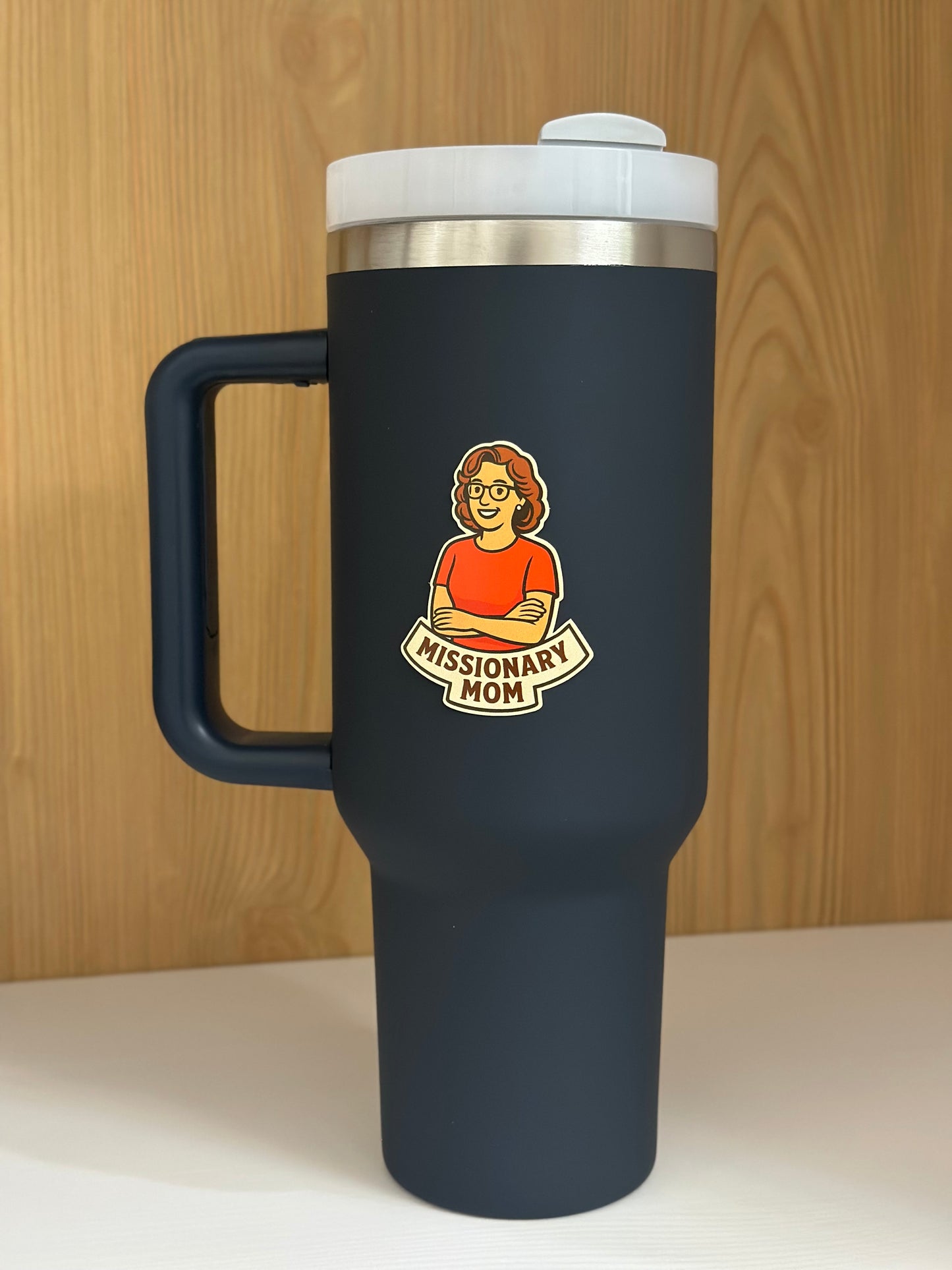Missionary mom product on navy blue water bottle 